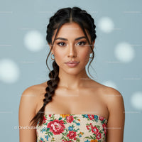 Portrait of Elegant Woman with Floral Dress and Long Braid