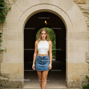 Casual Summer Look of Young Woman in Denim Skirt