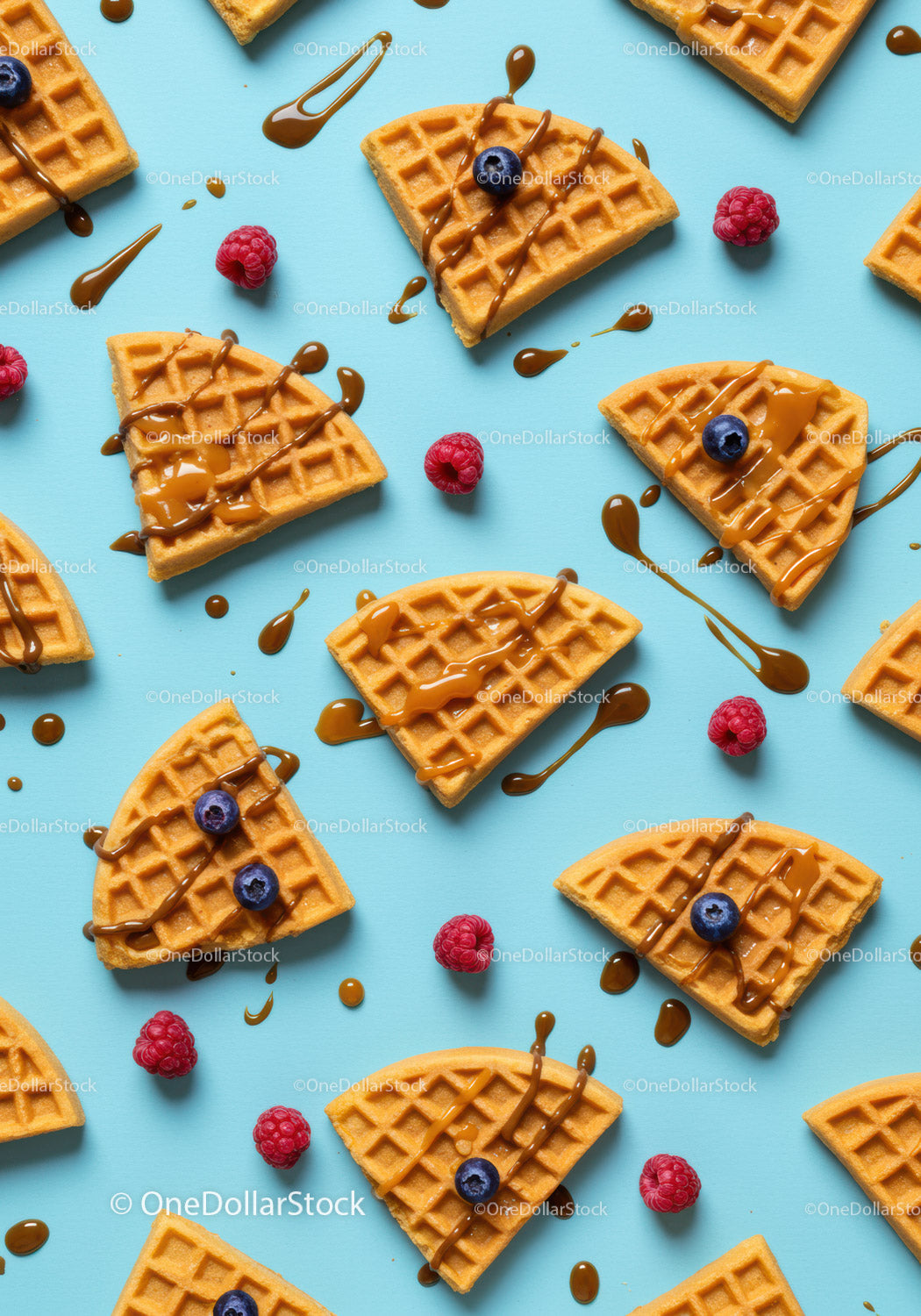 Waffle quarters with berries and caramel drizzle