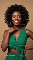 Vibrant Woman with Curly Hair Wearing Green Dress Expressing Joy