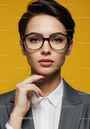 Professional Woman with Short Hair and Black Glasses in Business Attire