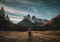 Majestic Mountain Landscape with Solo Hiker in Wilderness