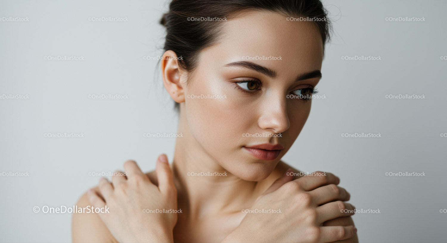 Elegant Female Portrait with Soft Lighting and Natural Makeup