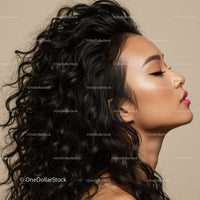 Profile of woman with voluminous curly black hair and makeup