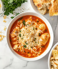 Hearty Tomato and Cheese Soup with Bread Slices