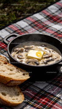 Creamy mushroom sauce with melting butter and bread