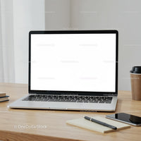 Modern laptop with blank screen on tidy wooden desk