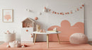 Stylish Baby Nursery with Pink and White Decor and Playful Elements
