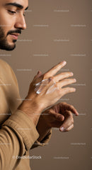 Male Applying Sunscreen Lotion in Close-Up for Skin Protection