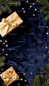 Festive gold wrapped gifts with pine branches on velvet