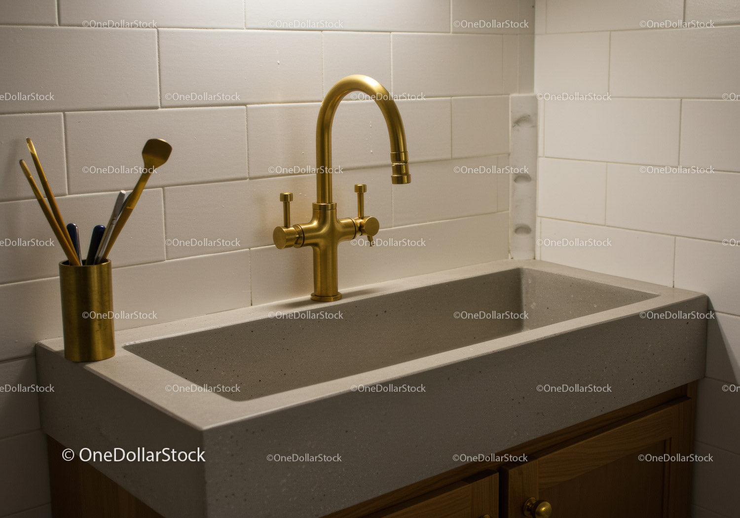 Modern Kitchen Sink with Brass Faucet and Granite Countertop