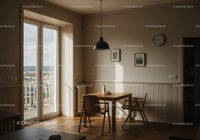 Cozy dining area with sunlight streaming through glass door