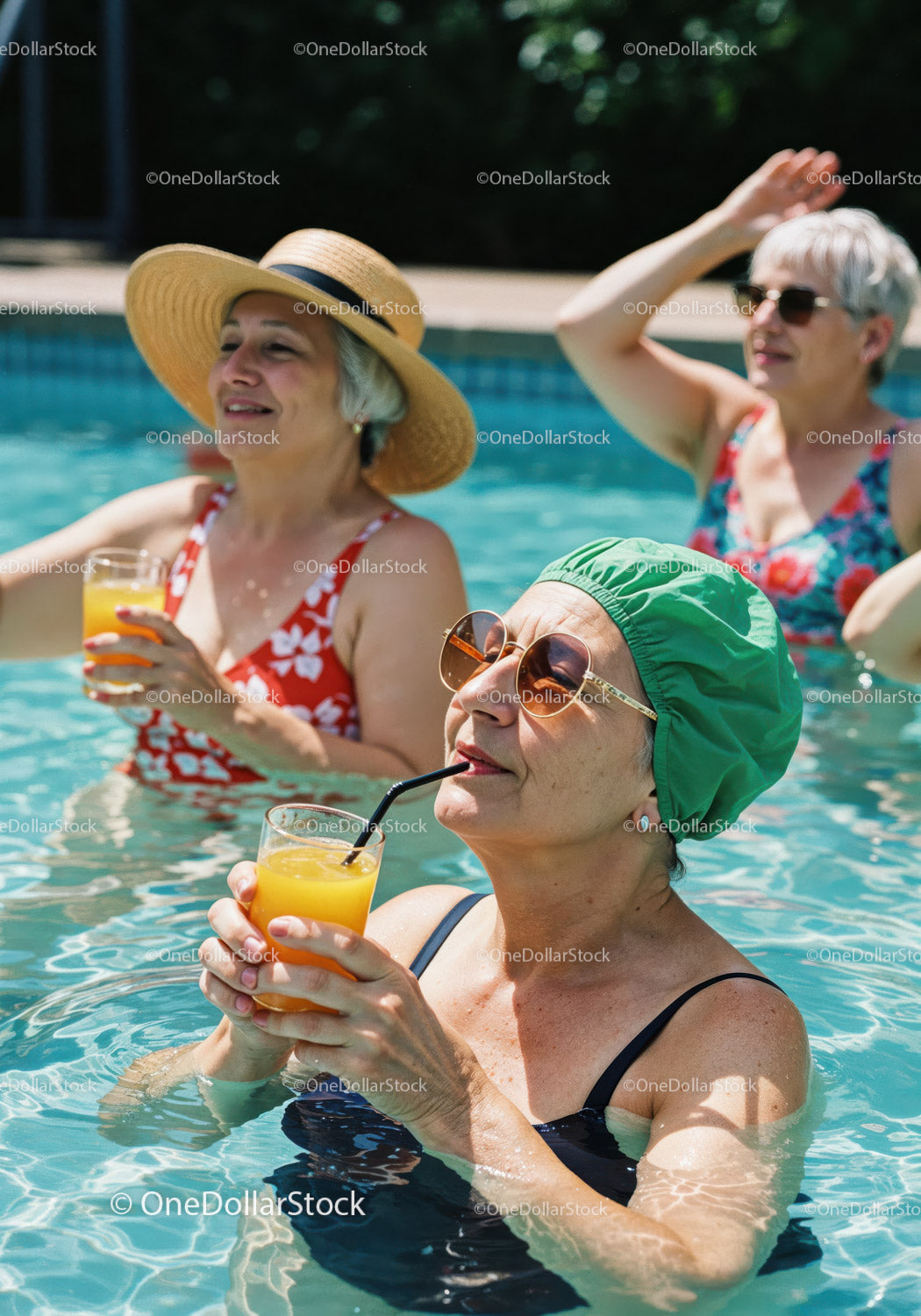 Elderly Women Relaxing and Drinking Refreshing Drinks in Pool