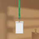 Blank ID Badge with Green Lanyard on Brown Background