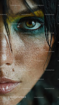 Close-up of Woman's Eye with Artistic Makeup and Bright Colors