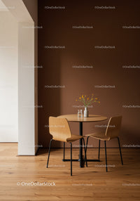 Modern minimalist dining corner with wooden table and chairs