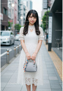 Young Woman in White Lace Dress Standing on Urban City Sidewalk