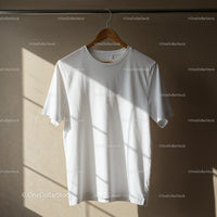 Plain White T Shirt Hanging on Wooden Hanger