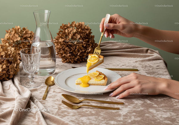 Elegant Lemon Tart on Fine Table Setting with Gold Cutlery