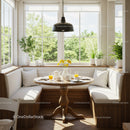 Cozy breakfast nook with natural light and greenery