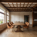 Elegant Wooden Dining Room with Brown Chairs and Large Windows