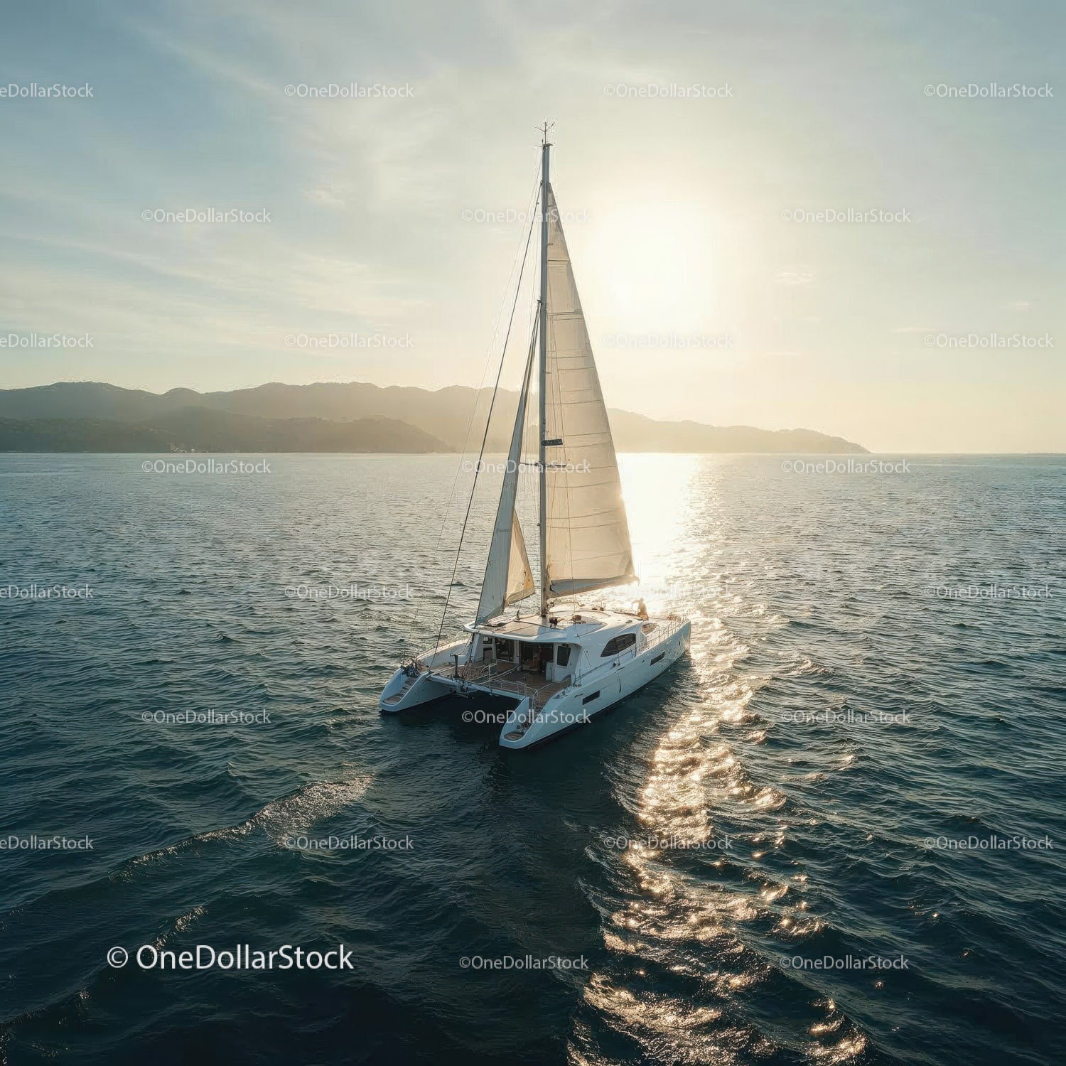 Luxury Sailing Yacht Riding Calm Ocean at Sunset