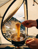 Cooking Steaming Noodles Inside a Mountain Tent
