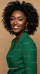 Elegant Black Woman with Curly Hair Wearing Green Blazer Studio Portrait