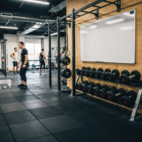 Modern gym interior with people training and equipment