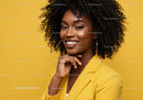 Vibrant Portrait of a Smiling Woman in Bright Yellow Blazer