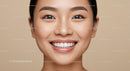 Close up of smiling woman with flawless skin and bright teeth