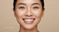 Close up of smiling woman with flawless skin and bright teeth