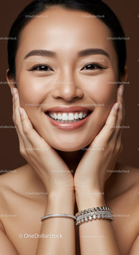Close up of smiling woman with flawless skin and jewelry