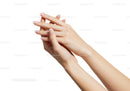 Close up of well-groomed hands with french manicure