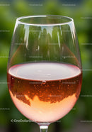 Close up of refreshing rosé wine in elegant glass
