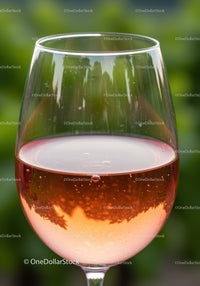 Close up of refreshing rosé wine in elegant glass