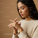 Elegant Woman Applying Skincare Cream for Healthy Glowing Skin
