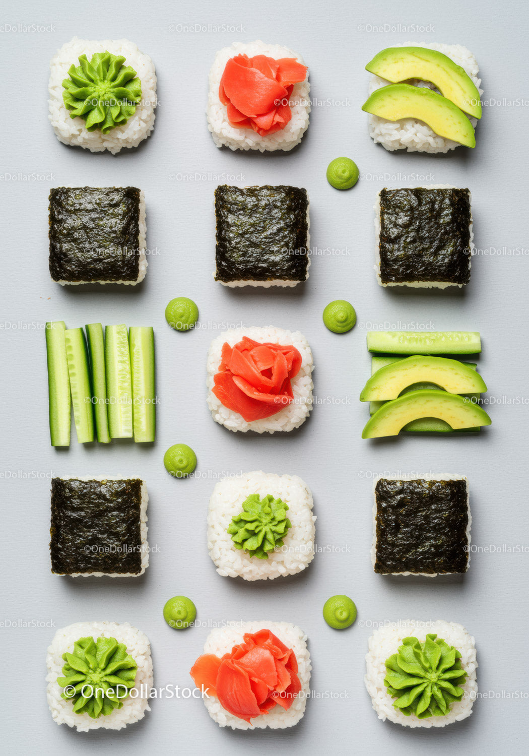 Różne kawałki sushi z awokado, ogórkiem i wasabi