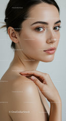 Beautiful Young Woman with Clear Skin and Natural Makeup