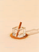 Ice cube with cinnamon sticks on beige background