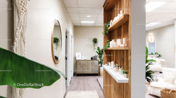 Modern Wellness Reception with Wooden Shelves and Greenery