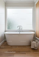 Elegant Modern Freestanding Bathtub with Frosted Window in Bright Bathroom