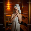 Young Woman in Towel and Sauna in Wellness Center