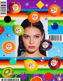 Young woman surrounded by colorful floating fruits