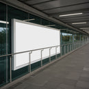 Empty modern billboard on glass wall in urban corridor