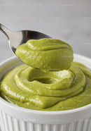 Creamy Avocado Dip in White Ceramic Bowl with Spoon