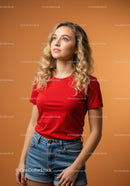 Young woman with wavy hair in casual summer outfit