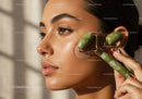Young Woman Using Jade Facial Roller for Rejuvenating Skincare