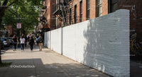 Urban City Street with Pedestrians and Bright Sunlight