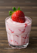 Fresh strawberry yogurt smoothie in clear glass cup